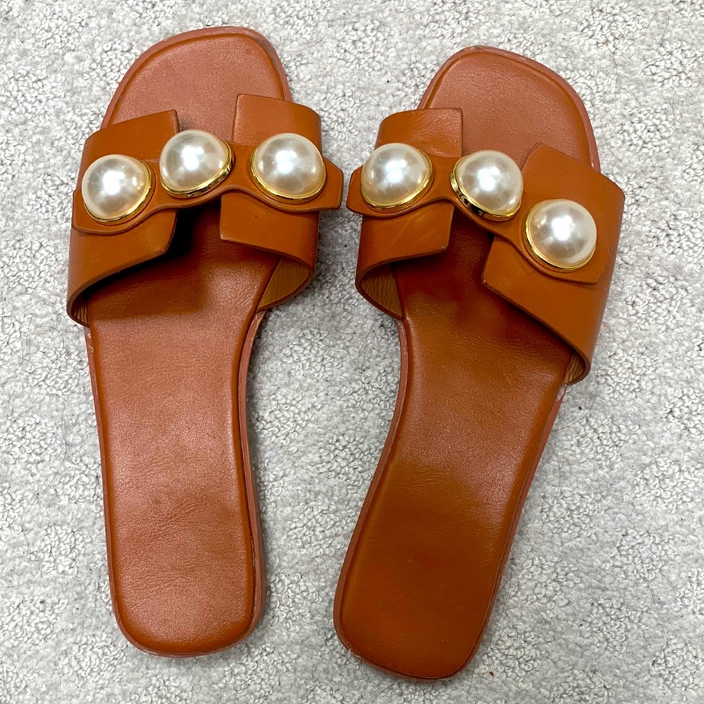 Super cute slides with pearl accents, gently used.